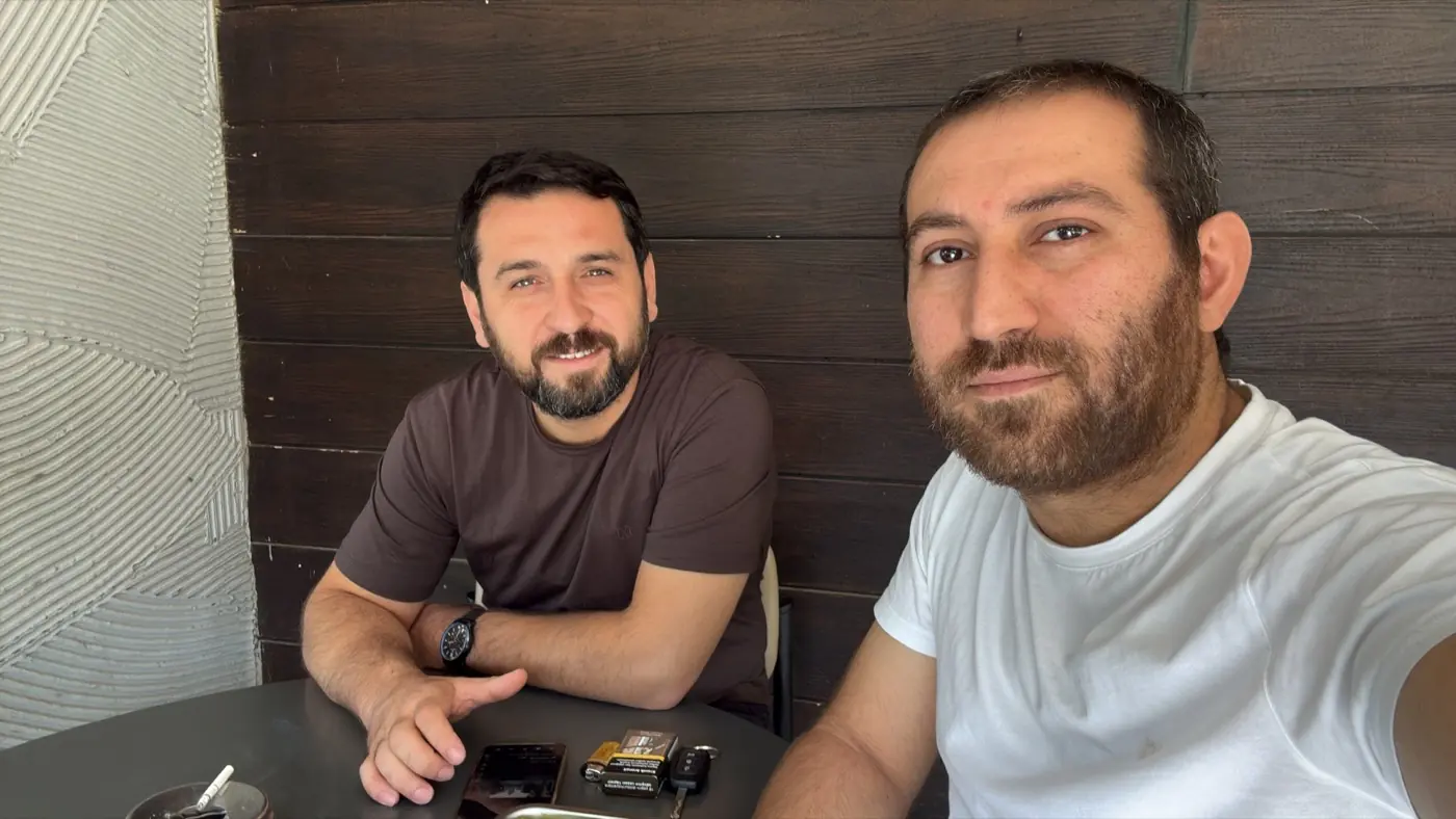 Two people sitting at a table